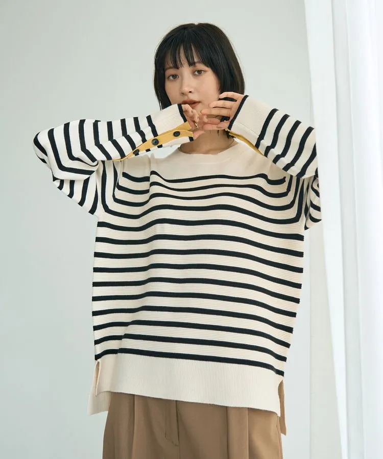 釦デザイン配色ニット